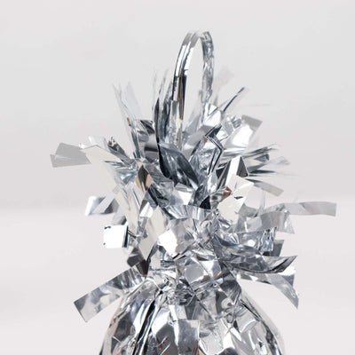 Silver metallic gift wrap with decorative fringe
