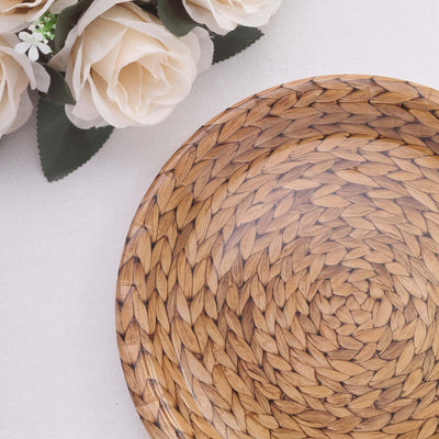 Woven wicker plate with floral accents on a light background.