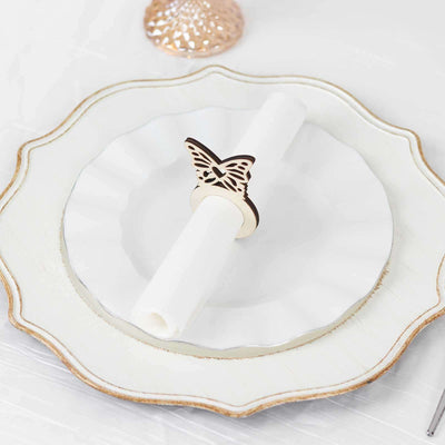 Butterfly napkin ring on a white plate for elegant table settings