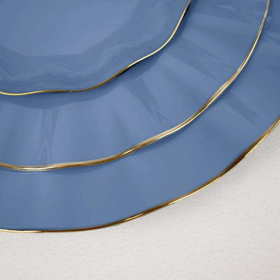 Blue plates with gold rim, stacked elegantly.