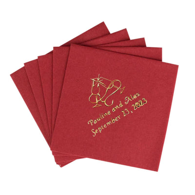 Embroidered red napkins with "Pauline and Alex September 13, 2023"