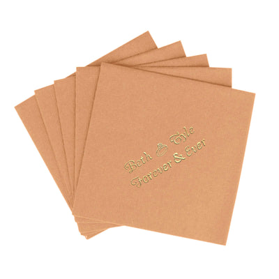 Personalized wedding guest book with gold foil text on a textured brown cover