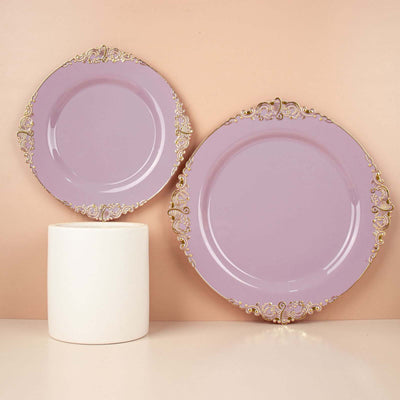 Elegant lavender plates with ornate gold trim against a soft pastel background.