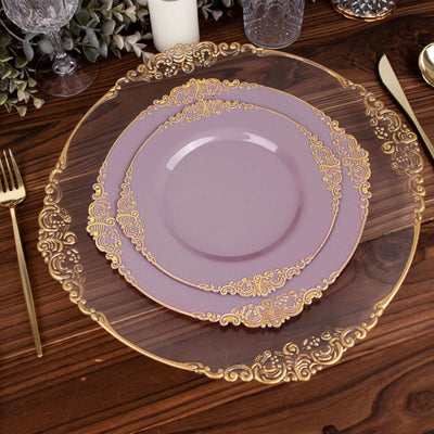 Elegant purple and gold plates set on a rustic wooden table.