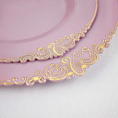 Elegant pink plates with ornate gold trim details.