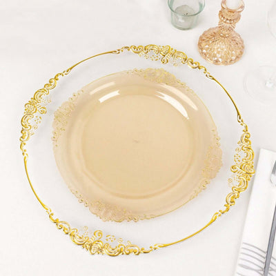 Elegant gold-trimmed decorative plate on a table setting.