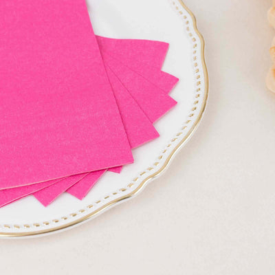 Bright pink paper sheets arranged on an elegant plate.