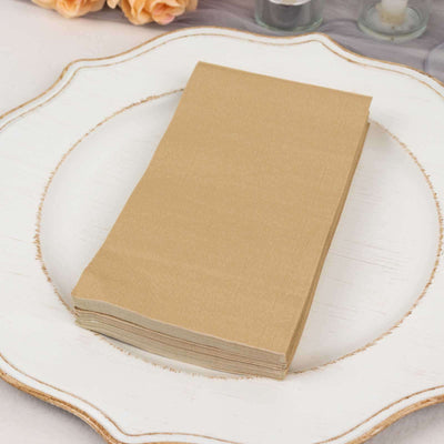 Brown paper napkins stacked neatly on a decorative plate.