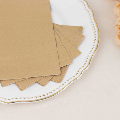 Brown textured cardstock sheets on a decorative plate.