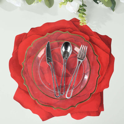 Decorative rose-shaped placemat with clear dinner plate and silver cutlery.