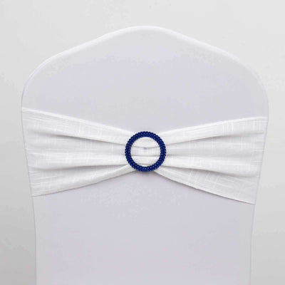 White chair cover with blue beaded ring accent