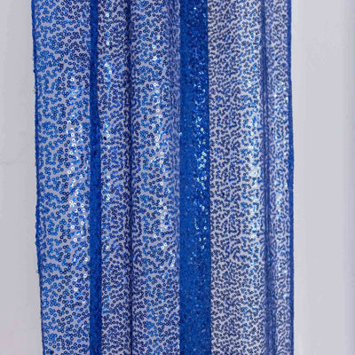 Blue sequin fabric with varying textures and patterns