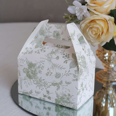 Floral print gift box on a table with decorative flowers.