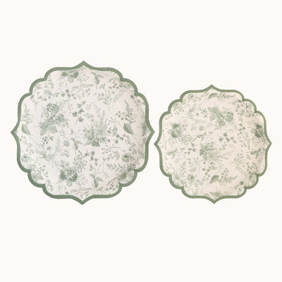 Green floral decorative plates in two sizes on a plain background
