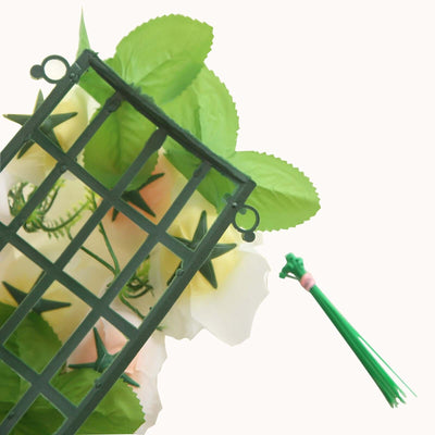 Green floral grid with leaves and flowers, studio isolation shot.