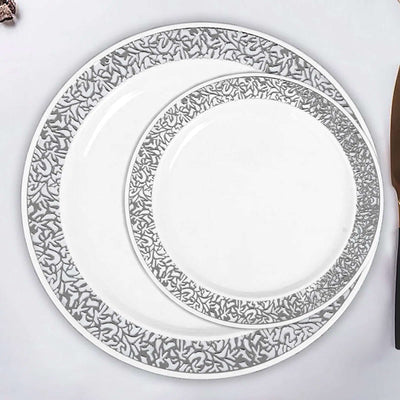 Elegant white dinner plates with intricate silver designs