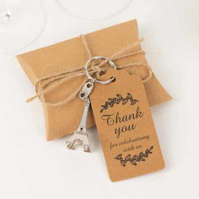 Eiffel Tower keychain with thank you tag on a gift box