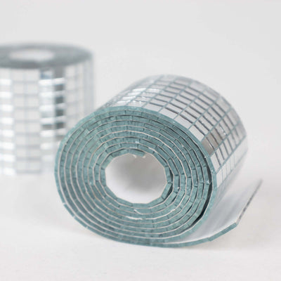 Mirror tape roll on a white background for crafting and DIY projects