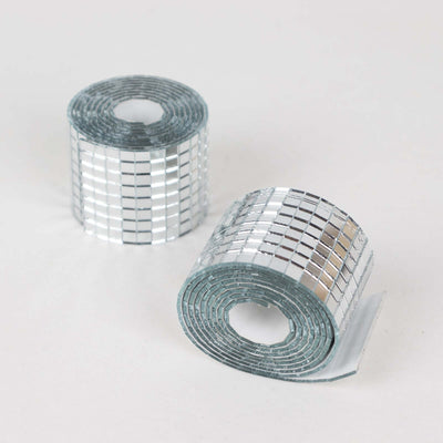 Mirror mosaic adhesive tape rolls on white background