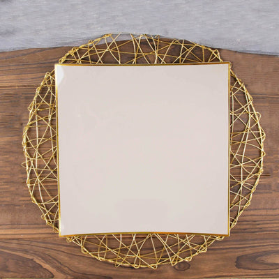 Square ceramic plate on a gold wire placemat.
