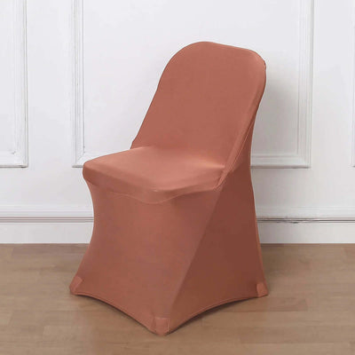 Peach-colored chair with a sleek design on a light wooden floor.