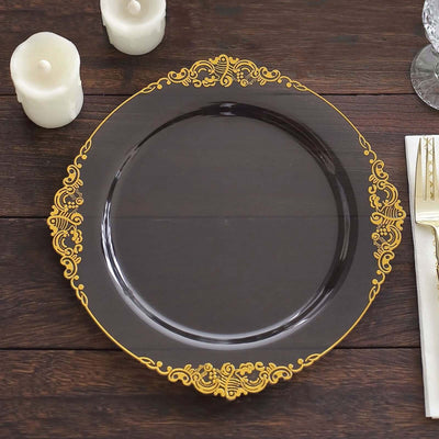 Elegant black plate with gold ornate design, perfect for dining occasions.