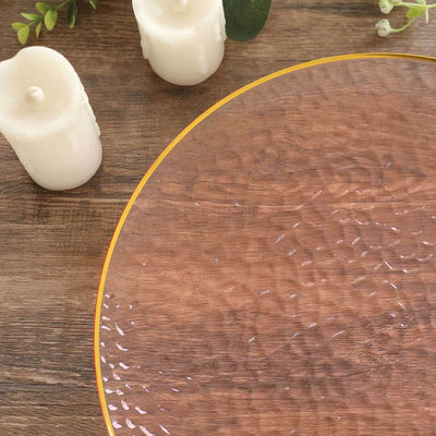 Decorative glass plate with a textured surface on a wooden table.