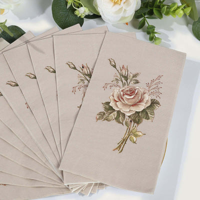 Embroidered rose design on beige napkins, set of eight.