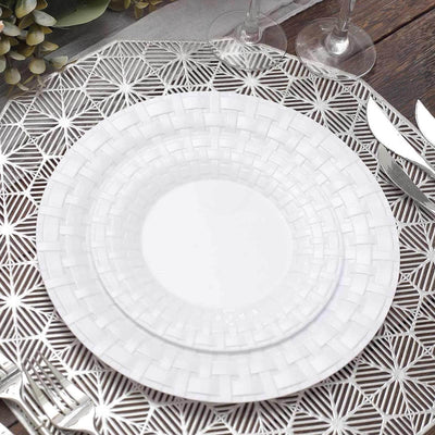 White woven dinner plate set on a decorative silver placemat.