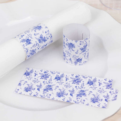 Floral-patterned table setting accessories on a white plate.