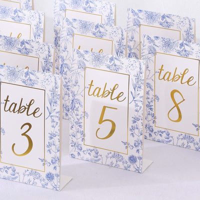 Elegant floral table numbers 3, 5, and 8 for event decor.
