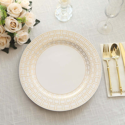 Elegant gold-accented dinner plate on a textured table setting.