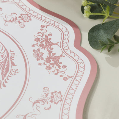 Decorative pink floral placemat with elegant design elements.
