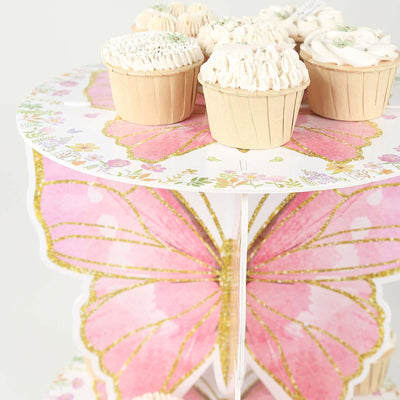 Cupcakes displayed on a decorative butterfly-themed cake stand.