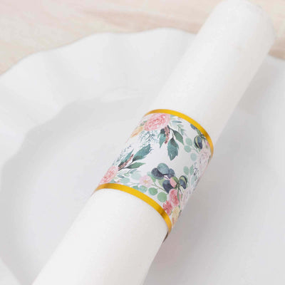 Floral napkin ring on a white plate