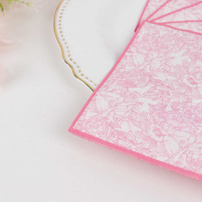 Pink floral stationery on a decorative plate.