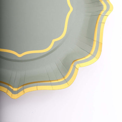 Green decorative plate with yellow trim on a white background