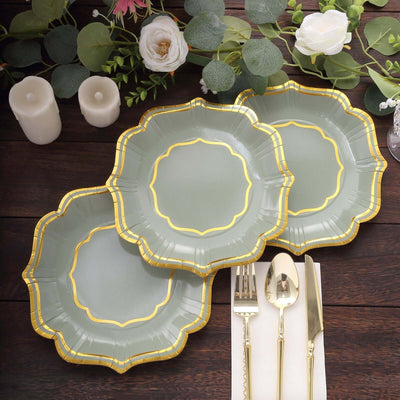 Elegant scalloped green plates with gold trim, perfect for dining occasions.