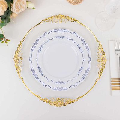 Elegant gold-trimmed dinner plate set with intricate blue floral design.