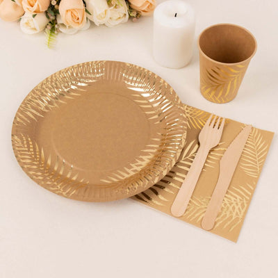 Eco-friendly gold leaf palm leaf dinnerware set on a neutral background.