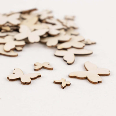 Wooden butterfly cutouts in various sizes for crafts and decoration.