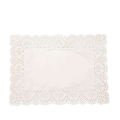 White lace paper doily with intricate border design on a plain background.