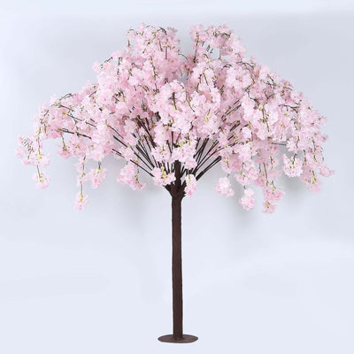 Artificial pink cherry blossom tree in full bloom