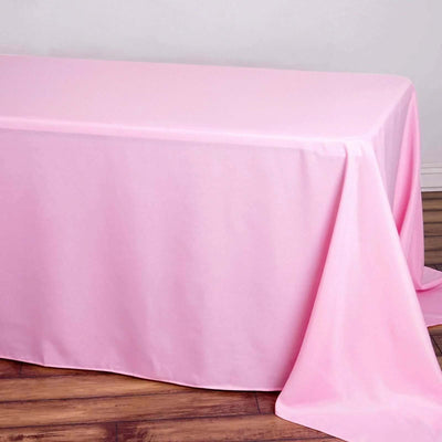 Pink tablecloth draped elegantly over a table.