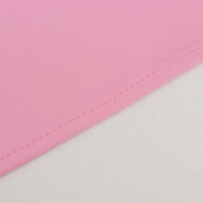 Pink fabric with a smooth texture and neat stitching detail.