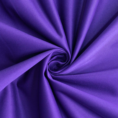 Purple fabric swirl showcasing texture and color.
