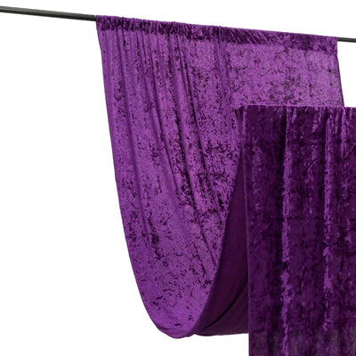 Purple velvet fabric draped on a rod, showcasing texture and color.