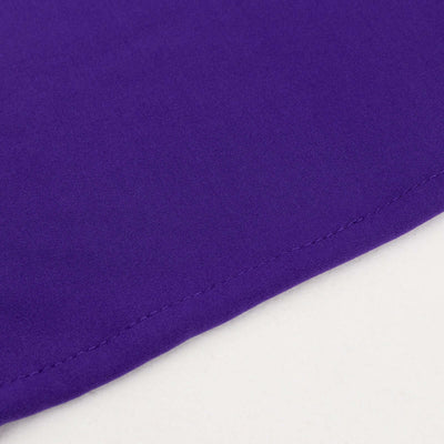 Purple fabric close-up showing smooth texture and stitching details.