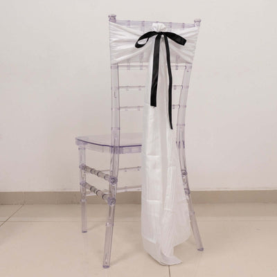 Clear chiavari chair with white and black bow on back