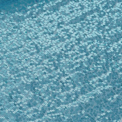 Blue sequin fabric texture background.